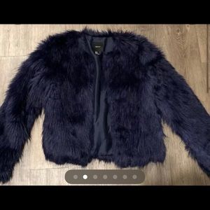 Fur coat in Navy.